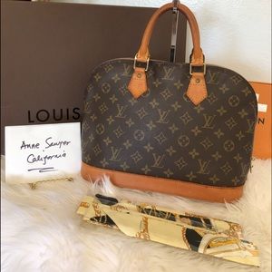Authentic vintage LV alma hand bag